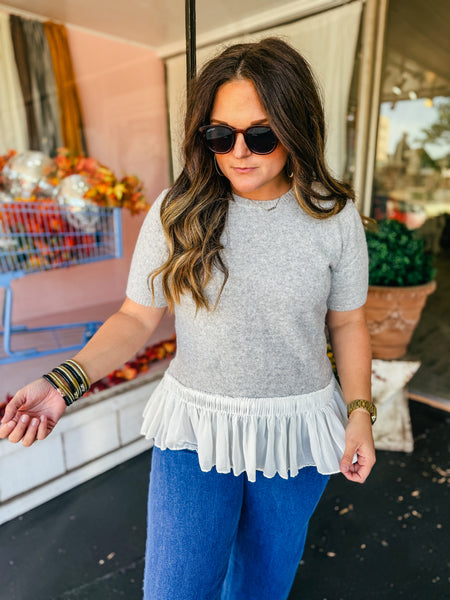 Grey Sweater with ruffle bottom