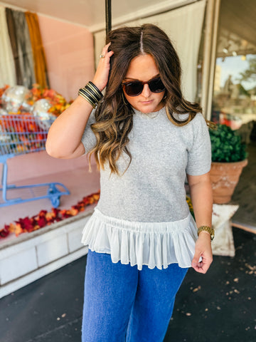 Grey Sweater with ruffle bottom
