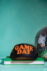 Ascot + Hart - Game Day Trucker  Black Hat / Orange Print  